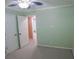 Bedroom features light-green walls, neutral carpet, and two closet doors at 1341 Timbercrest Ct, Lawrenceville, GA 30045