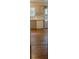 View of the kitchen with wood floors at 1341 Timbercrest Ct, Lawrenceville, GA 30045