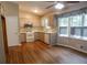 Charming kitchen with modern appliances, wood floors, and natural light at 1341 Timbercrest Ct, Lawrenceville, GA 30045