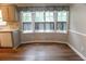 Bright kitchen nook area with large windows and wood flooring at 1341 Timbercrest Ct, Lawrenceville, GA 30045