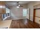 Cozy kitchen with ceiling fan, wood floors, and access to additional rooms at 1341 Timbercrest Ct, Lawrenceville, GA 30045