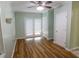 Cozy living room with wood floors and access to an outdoor space at 1341 Timbercrest Ct, Lawrenceville, GA 30045