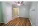 Inviting living room with wood floors, and light green walls at 1341 Timbercrest Ct, Lawrenceville, GA 30045
