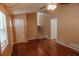 Inviting living room with hardwood floors and access to the staircase at 1341 Timbercrest Ct, Lawrenceville, GA 30045