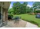 An inviting backyard offers a patio and lush lawn, perfect for outdoor relaxation and entertaining at 1541 Eldonlas Ct, Stone Mountain, GA 30087