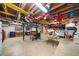 Large unfinished basement with exposed beams, concrete flooring, and plenty of space to customize at 1541 Eldonlas Ct, Stone Mountain, GA 30087