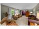 Cozy living room with plush seating and natural light at 1541 Eldonlas Ct, Stone Mountain, GA 30087