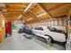 Spacious shed interior with exposed studs is being used as a shop and storage area at 1541 Eldonlas Ct, Stone Mountain, GA 30087