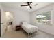 Well-lit bedroom with closet, carpet, a window and view of the backyard at 340 Monivea Ln, Roswell, GA 30075