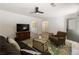 Open living room features a neutral color palette, comfortable seating, and easy access to other living spaces at 340 Monivea Ln, Roswell, GA 30075