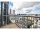 Balcony view of the city skyline with skyscrapers and cloudy skies at 855 Peachtree Ne St # 2203, Atlanta, GA 30308