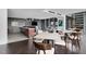 Resident lounge area with a kitchen, seating, and dining space for social gatherings at 855 Peachtree Ne St # 2203, Atlanta, GA 30308