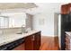 Well-appointed kitchen with granite counters, stainless steel appliances, and ample cabinet space at 855 Peachtree Ne St # 2203, Atlanta, GA 30308