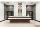 Elegant lobby featuring a modern reception desk, stylish lighting, and sophisticated decor at 855 Peachtree Ne St # 2203, Atlanta, GA 30308