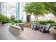 Outdoor seating area with water feature, offering residents a relaxing space at 855 Peachtree Ne St # 2203, Atlanta, GA 30308