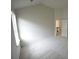 Bedroom featuring plush carpet, a bright window, and a door at 2289 Overlook Ave, Lithonia, GA 30058