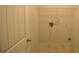 A compact laundry room area features tile flooring, wire shelving, and utility hookups at 2289 Overlook Ave, Lithonia, GA 30058