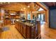 Spacious kitchen with wooden cabinetry, granite countertops, and stainless steel appliances at 4095 E Highway 166 Hwy, Carrollton, GA 30116