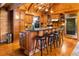 Beautiful kitchen with hardwood floors, lots of counter space, and wooden cabinets provides a warm, inviting atmosphere at 4095 E Highway 166 Hwy, Carrollton, GA 30116