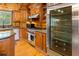 A well-designed kitchen, with a stainless steel fridge and modern appliances, offering style, convenience, and functionality at 4095 E Highway 166 Hwy, Carrollton, GA 30116