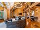 Spacious living room with high ceilings, modern lighting, and lots of natural light offers a comfortable and stylish retreat at 4095 E Highway 166 Hwy, Carrollton, GA 30116