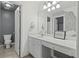 Stylish bathroom with clean lines, modern fixtures, and a decorative wall accent at 4842 Registry Nw Dr, Kennesaw, GA 30152