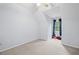 Bright, inviting bedroom with plush carpeting and natural light from a large window at 4842 Registry Nw Dr, Kennesaw, GA 30152