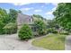 A beautiful exterior elevation with an expansive lawn and driveway at 4842 Registry Nw Dr, Kennesaw, GA 30152