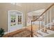 Welcoming foyer showcasing the front door, staircase, and elegant details at 4842 Registry Nw Dr, Kennesaw, GA 30152
