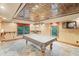 Basement game room features a billiards table, dart board and tin ceiling at 4842 Registry Nw Dr, Kennesaw, GA 30152