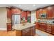 Gourmet kitchen with granite countertops, stainless steel appliances, and custom cabinetry at 4842 Registry Nw Dr, Kennesaw, GA 30152