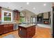 Bright kitchen features custom cabinets, an island and stainless steel appliances at 4842 Registry Nw Dr, Kennesaw, GA 30152