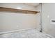 Unfinished basement space with bare concrete floors, closet and utility connections ready for customization at 510 Aiken Dr, Dallas, GA 30157