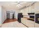 Spacious kitchen with tiled floors, white cabinetry, butcher block counters, and updated appliances at 510 Aiken Dr, Dallas, GA 30157