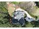 Sprawling home with manicured landscaping and a circular driveway, privately set on a lush, green lot at 5360 Northwater Way, Duluth, GA 30097