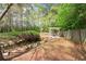 Backyard with walkway, gazebo and trees at 5360 Northwater Way, Duluth, GA 30097