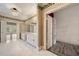 Spacious bathroom featuring dual vanities, a decorative chandelier, and a separate walk-in closet at 5360 Northwater Way, Duluth, GA 30097