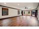 Spacious bedroom with dark trim, hardwood floors and many windows at 5360 Northwater Way, Duluth, GA 30097