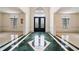 Grand foyer with marble flooring and a decorative front door at 5360 Northwater Way, Duluth, GA 30097