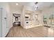 Bright kitchen with white cabinets, stainless appliances, and light wood flooring at 5360 Northwater Way, Duluth, GA 30097