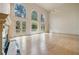 Bright, spacious living room with expansive windows and fireplace at 5360 Northwater Way, Duluth, GA 30097