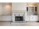 Cozy living room featuring fireplace and built-in shelves at 5360 Northwater Way, Duluth, GA 30097