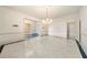 Spacious living room with chandelier and access to other rooms at 5360 Northwater Way, Duluth, GA 30097