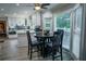 Eat-in kitchen with white cabinets, stainless appliances, and lots of natural light at 910 Kings Arms Way, Alpharetta, GA 30022