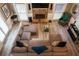 Large living room with stone fireplace, providing a cozy place to gather with Gathering and friends at 910 Kings Arms Way, Alpharetta, GA 30022