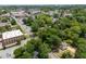 Aerial view showcasing the house and surrounding area, framed by mature trees at 95 Whitlock Sw Ave, Marietta, GA 30064