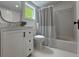 Updated bathroom features tile flooring, classic vanity, and shower with tiled enclosure at 95 Whitlock Sw Ave, Marietta, GA 30064