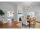 Beautiful dining room with a fireplace and French doors leading to the living room at 95 Whitlock Sw Ave, Marietta, GA 30064