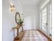 Bright entryway featuring hardwood floors, stylish decor, and a charming rug at 95 Whitlock Sw Ave, Marietta, GA 30064