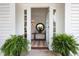 Open entryway with hardwood floors, and a stylish mirror and console table at 95 Whitlock Sw Ave, Marietta, GA 30064